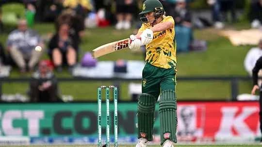 Jugador bateando durante un partido de cricket