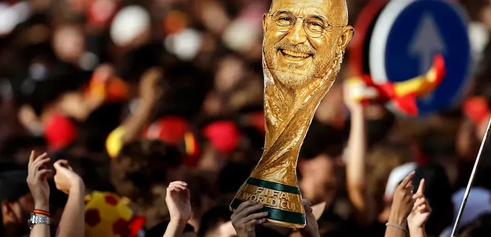 Celebration with FIFA World Cup trophy in crowd