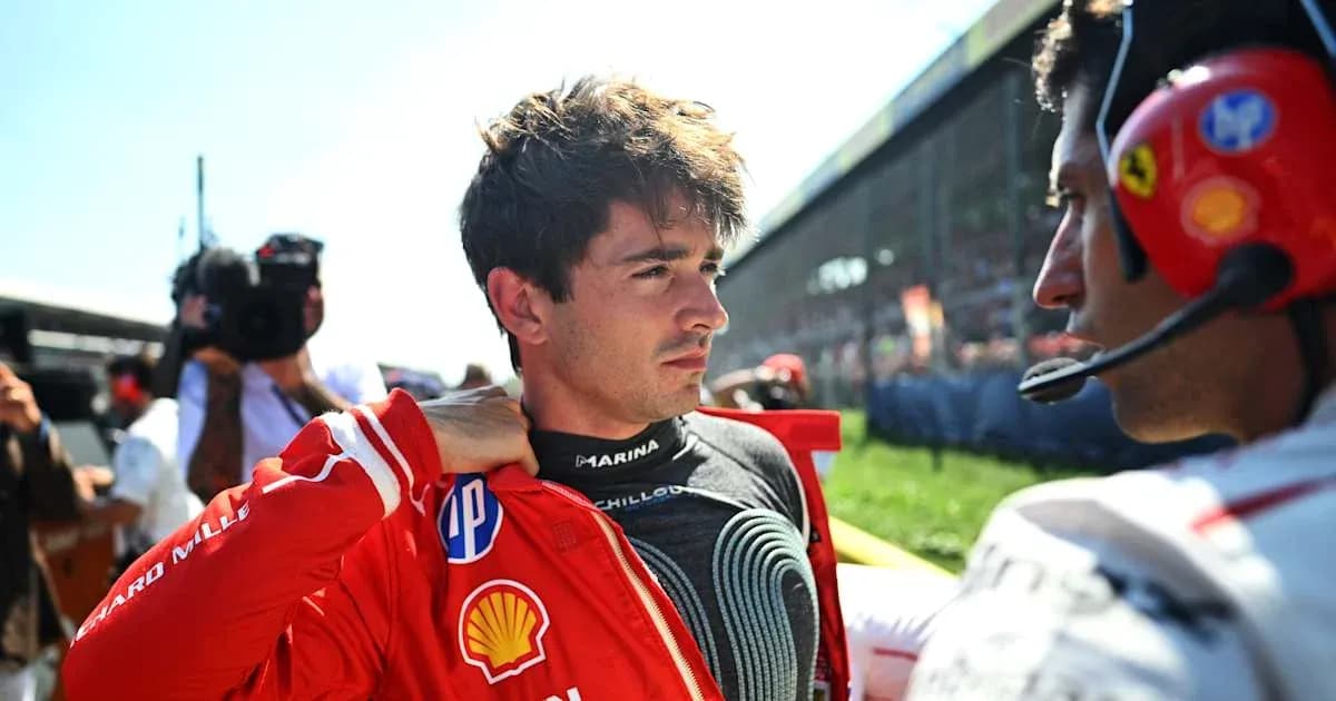 Piloto preparándose antes de la carrera en pista