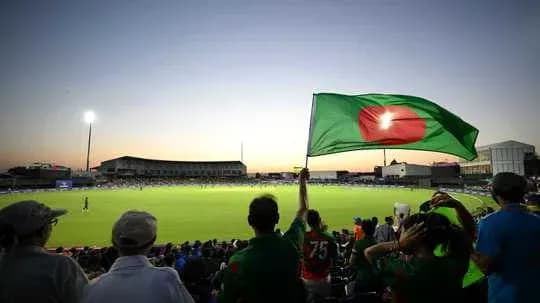 Afan waving Bangladesh flag in cricket stadium