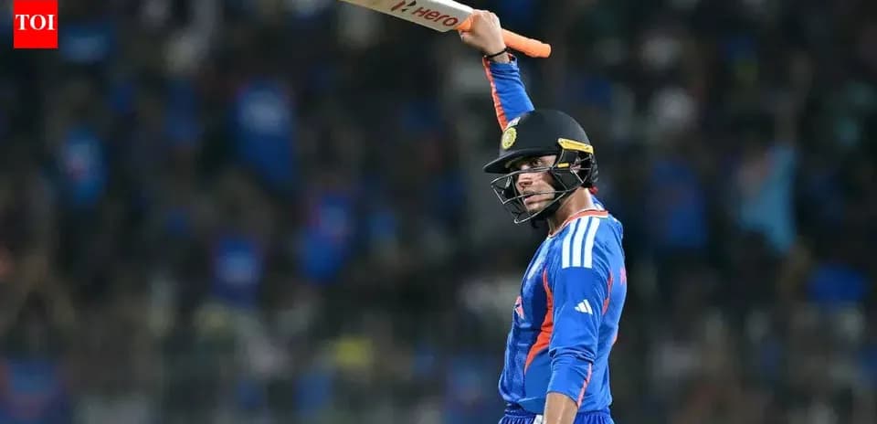Jugador de cricket levantando su bate en celebración