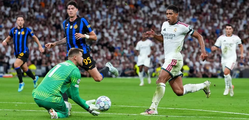 Jugadores de Real Madrid y Inter en acción durante partido