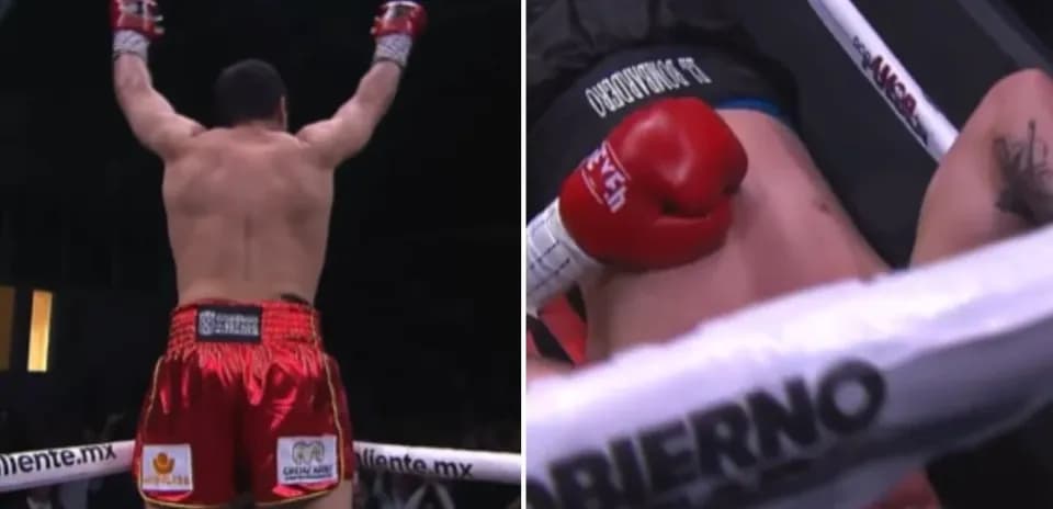 Boxeador levantando los brazos tras la victoria