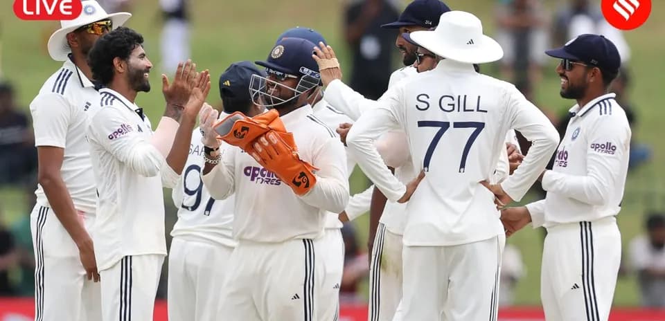 Jugadores de cricket de India celebrando un wicket