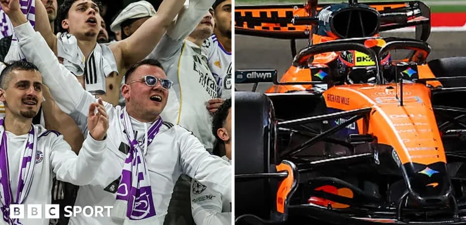 Aficionados animando y coche de Fórmula 1 en pista