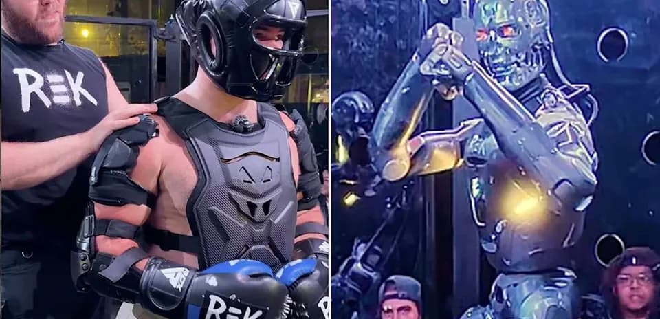 Competitor in protective gear facing a robot opponent
