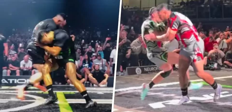 Luchadores en combate durante evento deportivo