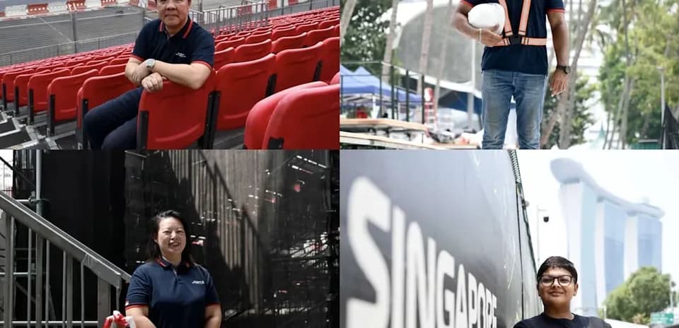 Cuatro personas en el circuito de carreras de Singapur