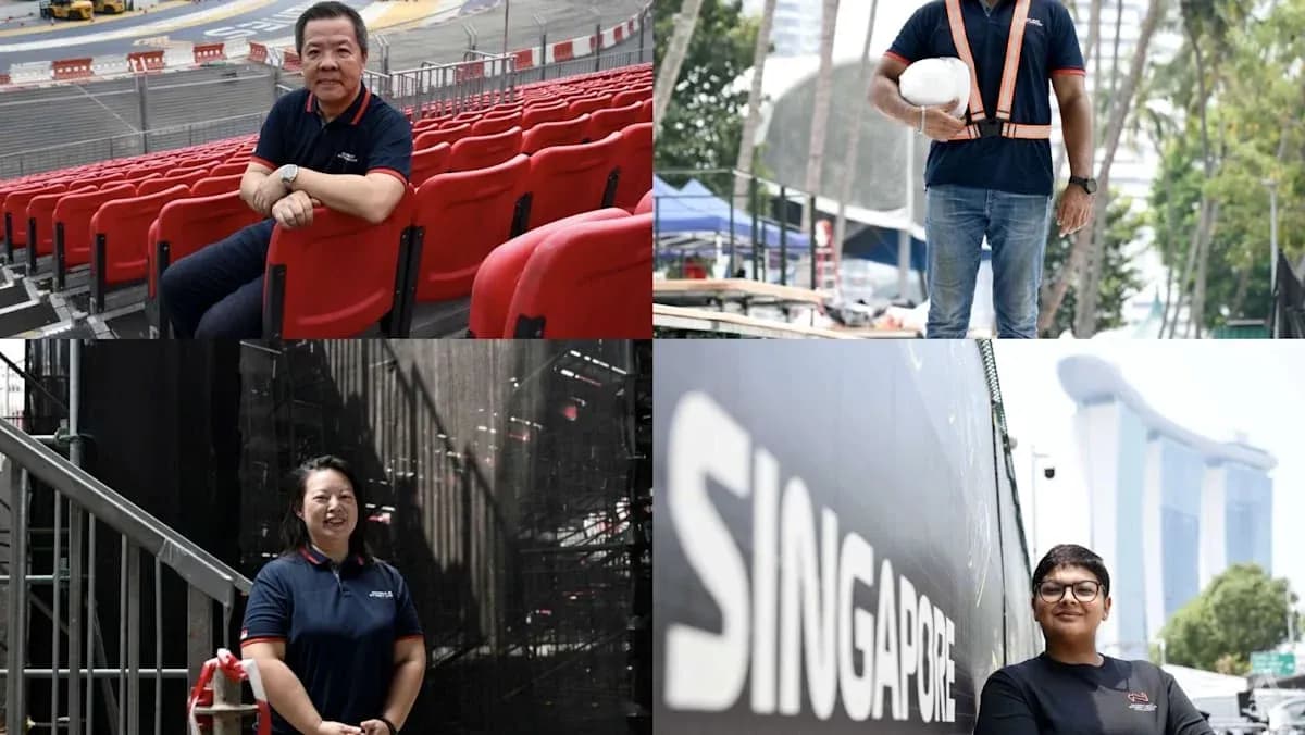Cuatro personas en el circuito de carreras de Singapur