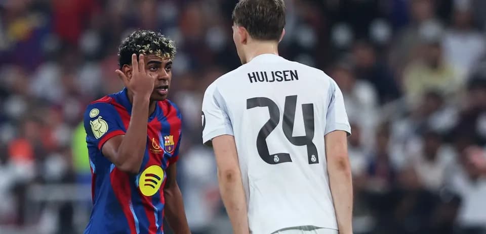 Jugadores de Barcelona y Real Madrid en el partido