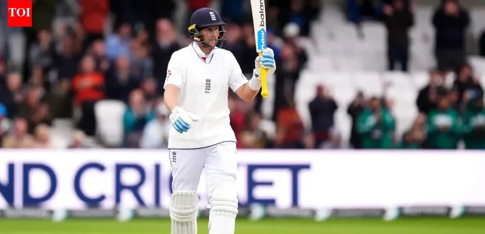Bateador de Inglaterra levantando el bate en celebración