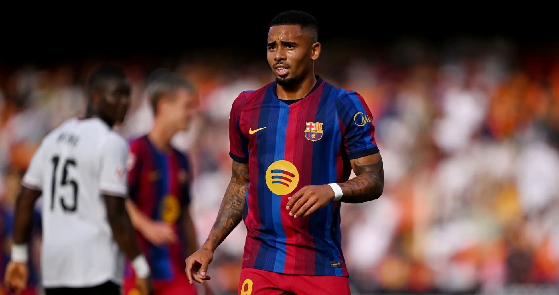 Jugador de Barcelona en partido contra Valencia Jugador de Barcelona en partido contra Valencia