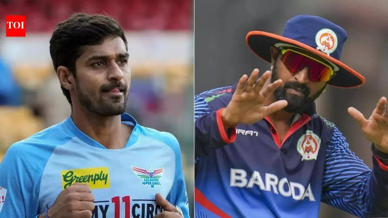 Jugadores de cricket en uniforme de sus equipos Jugadores de cricket en uniforme de sus equipos