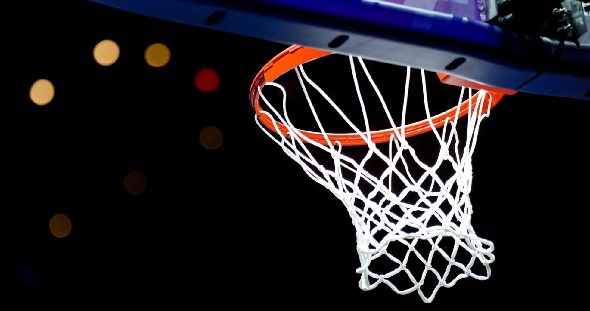 A close-up of a basketball hoop and net A close-up of a basketball hoop and net