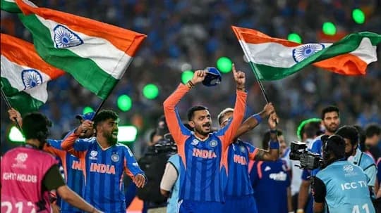 Jugadores de India celebrando con banderas en el estadio Jugadores de India celebrando con banderas en el estadio