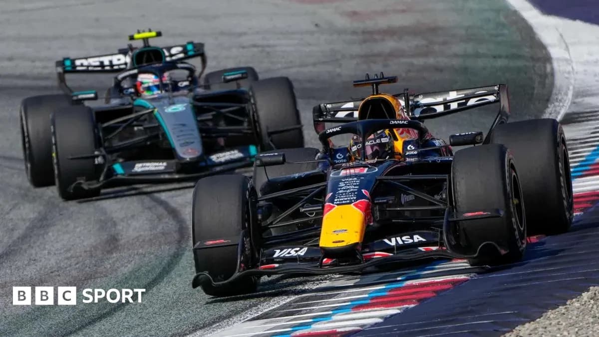 Dos coches de Fórmula 1 compitiendo en curva Dos coches de Fórmula 1 compitiendo en curva
