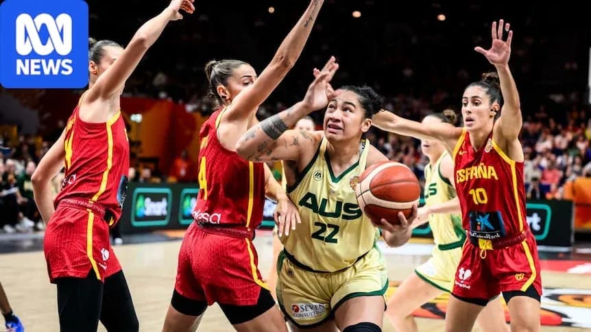 Jugadora de Australia intentando anotar contra España Jugadora de Australia intentando anotar contra España