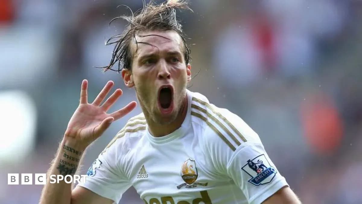 Jugador celebrando un gol con camiseta del Swansea City Jugador celebrando un gol con camiseta del Swansea City